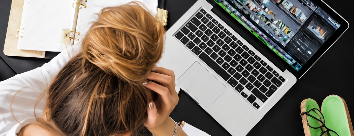 Hairstylist studying certification material